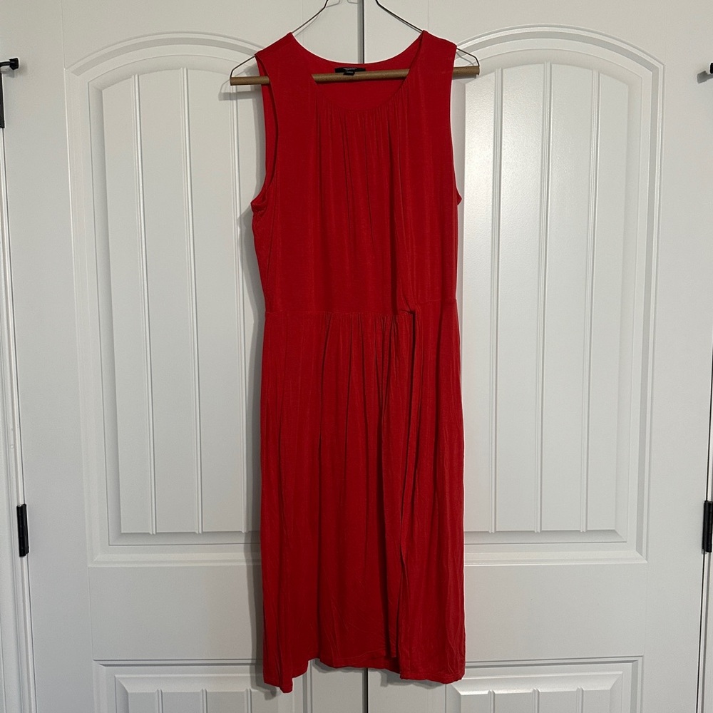Sleeveless red faux wrap dress
